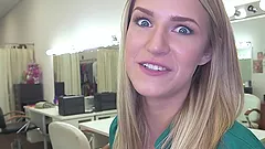 Stunning Dixie Belle gives a blowjob in a locker room