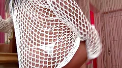 Lioness packs her thong in her pussy before pounding it with toy