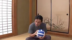 Two Japanese MILFs give a double blowjob to their coach