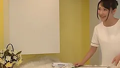 Japanese masseuse gives a handjob and gets fucked by a client