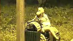 Mature hottie gets fucked from behind in a park at night