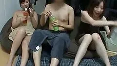 Pair of horny Japanese models get a handful of cum