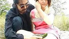 A chubby Japanese chick goes to a field to fuck