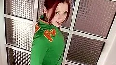 Redhead babe Faith is giving a real hot striptease