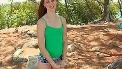 Redhead teeny tugging her BFs shaft at the beach