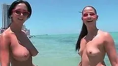 Big ass topless sex bombs have fun at the beach