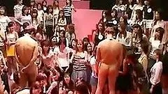 Kinky Japanese girls play with a cock and get facialed