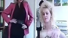 Busty blonde milf gives an ardent blowjob in a hot retro clip