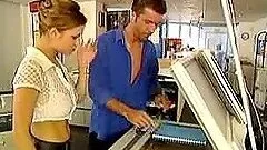 Blonde office chick gets fucked from behind near xerox machine