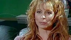 Retro video with curly blonde getting nailed on a sofa