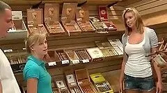 Small titted blonde strips naked in a store