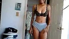 Beautiful ebony chick shows off her hairy vag and sucks her BF's cock