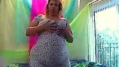 Fat mature blonde gives a titjob and a blowjob and gets facialed