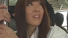 Naughty Japanese babe gets cummed in the crowded bus