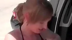Beach teen girl rubs and blows horny shaft in the car