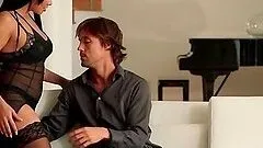 Brunette beauty blowing hard cock in close-up