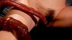 Slim and sexy Japanese girl shows her nude body and sucks something