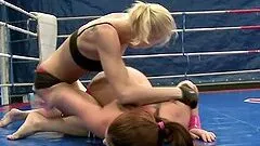 Blonde and brunette girls have hot lesbian sex after a nude battle