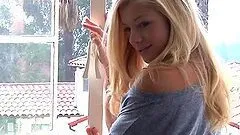 Nikki Leigh the slim California girl poses naked in the bedroom