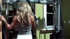 Sporty blonde Andrea Marie has a photosession in a gym