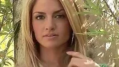 Nasty Breann McGregor poses naked sitting on the tree