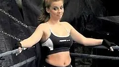 Two sexy girls have a sparring on the boxing ring