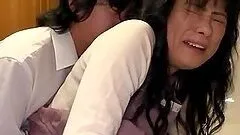 Mature Japanese chick gets fucked in her busy pussy