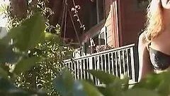 Sizzling Haleigh Lauren poses on the stairs outside the house