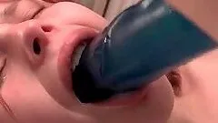 Piss lover lesbian babe gets mouth fucked with a dildo