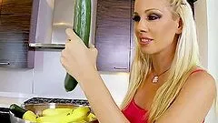 Nasty Sandy toys her ass and pussy with a cucumber