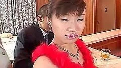 Lewd Japanese girl sucks two hard cocks and gets cum on her face