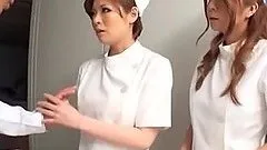 Two sexy Japanese nurses get naked and start riding his cock