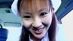 Playful Mari Yamada gives a blowjob in the car