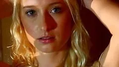 Lauren Ash the horny blonde poses naked in a sauna