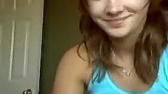 Teen does a striptease & masturbates on webcam