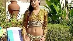 Brown-haired beauty fucks her pussy with a toy outdoors