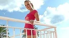 Balcony masturbation with a hot blond beauty