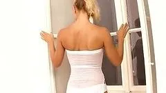 Soapy blond hottie gets naked and rubs her self in the shower