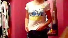 Chick in glasses stripping naked