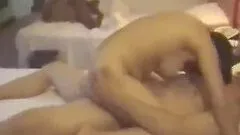 Chinese chick fucking in a hotel room