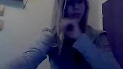 Skinny blonde babe stripping