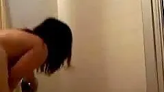 Hot brunette naked in the bathroom