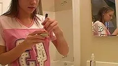 Hot Teen Puts Make Up In Homemade Clip