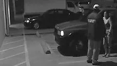 Parking Lot Action Caught By A Security Camera