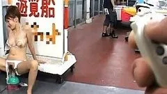 Reon Otowa fucks a sex toy outside a store flashing her cunt