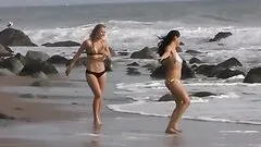 Gorgeous Babes Give A Lucky Guy One Hell Of A Handjob By The Beach