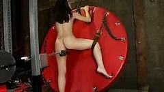 Babes Shows Her Hot Ass As A Fucking Machine Pounds Her Against A Wall