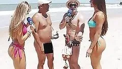 Brazilian Reporter On The Beach With Two Hot Babes