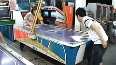 Playing Naked Air Hockey
