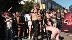 A crowd gathers to watch the brutal flogging